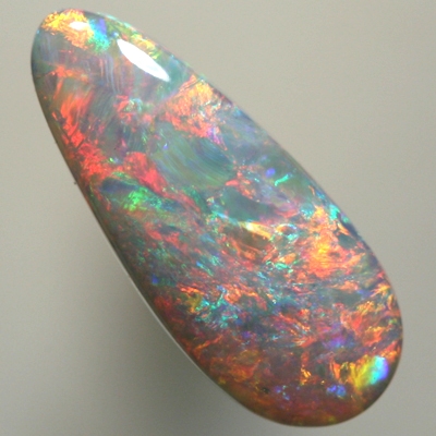 SOLID SEMI BLACK OPAL  Sparkling 3D pattern with reds, orange and green turquoise. SEE VIDEO